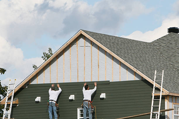 Professional Siding technician working in Riverside, OH